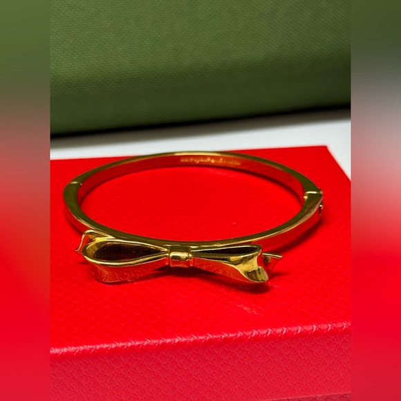 Kate Spade "Love Notes" Gold Bow Bangle - Picture 1 of 8